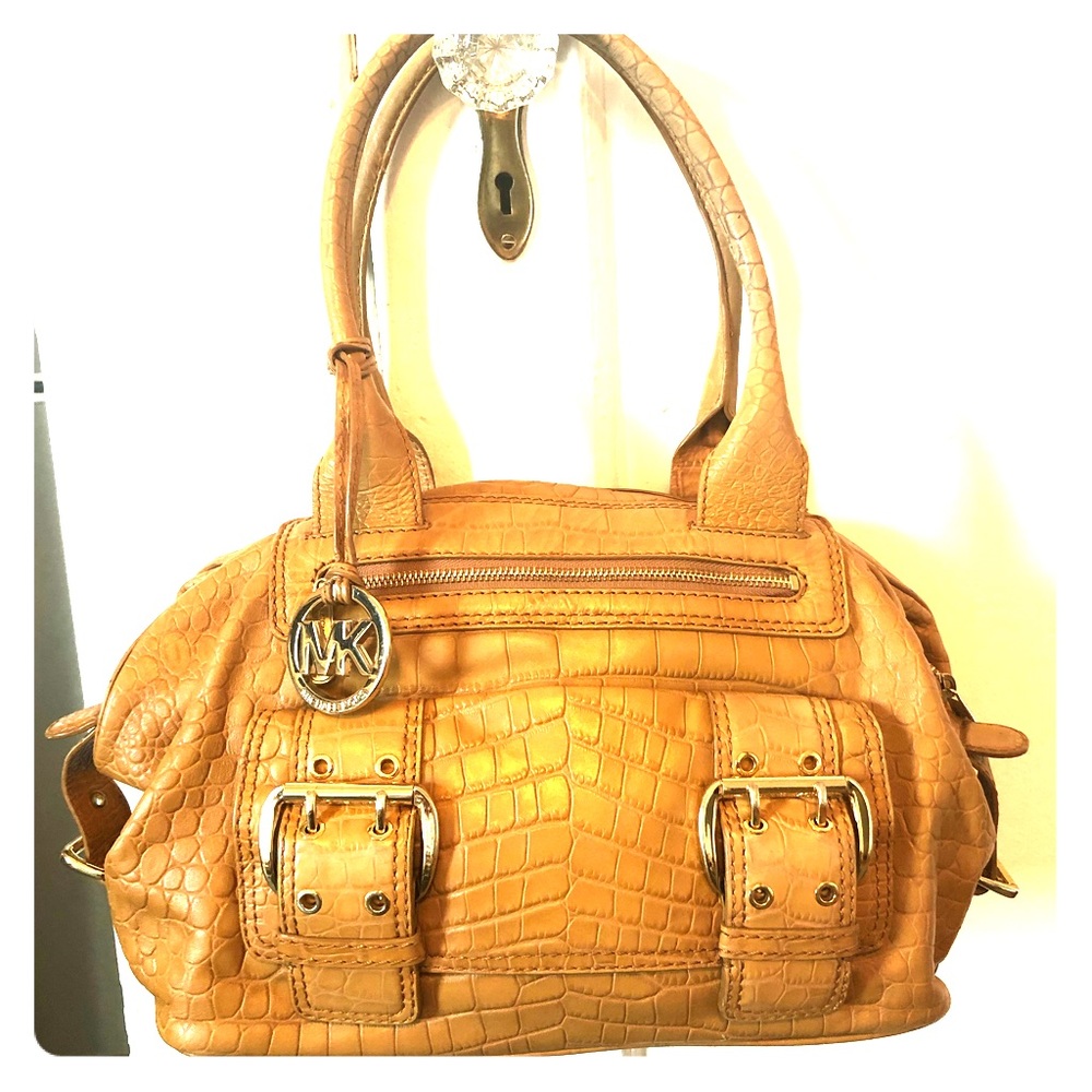 Tan colored crocodile pattern purse  Michael kors